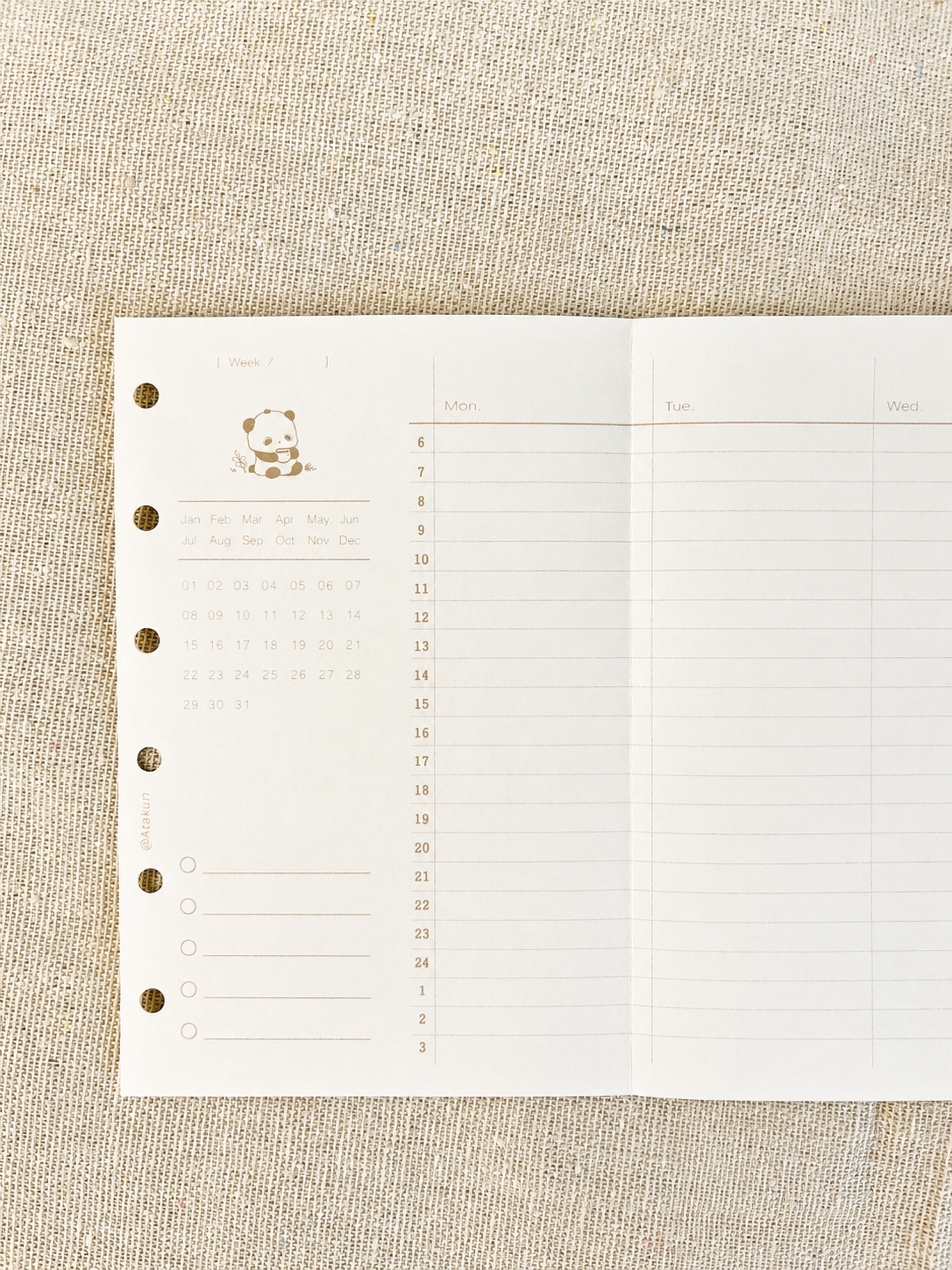 Printed Atakuri weekly planner insert with panda illustration on natural linen