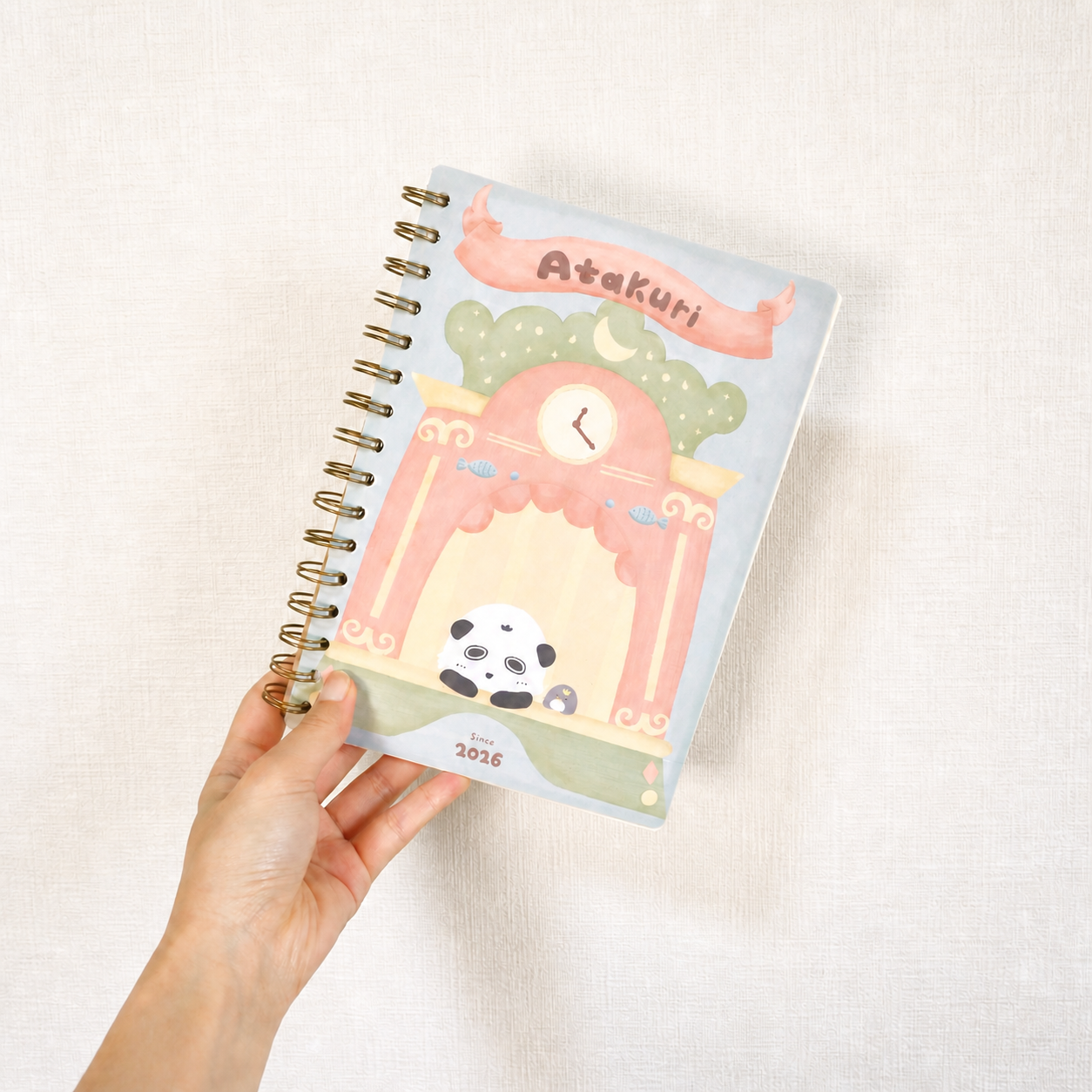 A Little Clock for 2026 illustrated A5 spiral notebook on soft fabric
